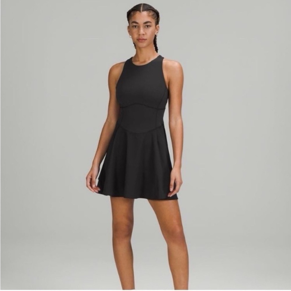 Lululemon Black Court Crush Tennis dress with built-in short, size 4.